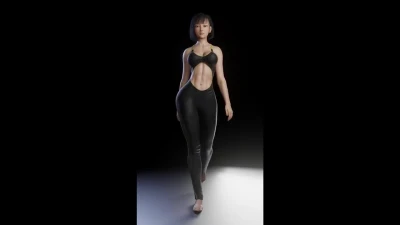 Athletic woman with short black bobbed hair walking toward camera on dark stage